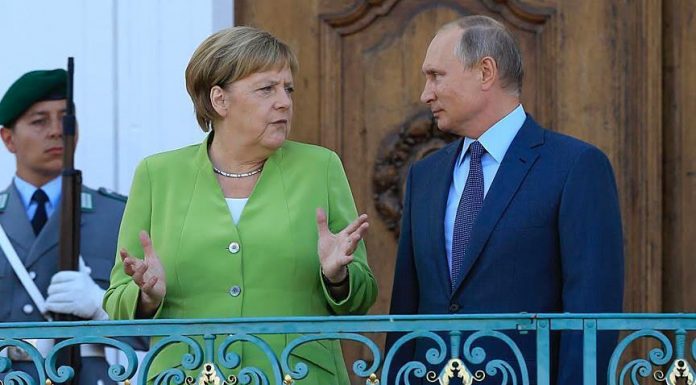 putin-merkel-c_d3c7a15f62bf46e3426320a05bb74cee