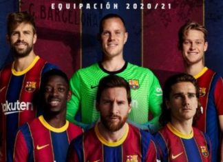 Një baner me mesazh thumbues për lojtarët aktual të skuadrës së Barcelonës
